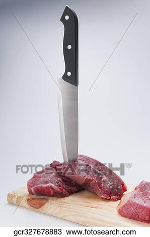 Close-up of rump steaks with a knife View Large Photo Image Stock Image - Close-up of rump steaks with a knife. Fotosearch