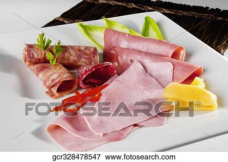 Close-up of salami with ham slices and cheese View Large Photo Image Stock Photo - Close-up of salami with ham slices and cheese. Fotosearch