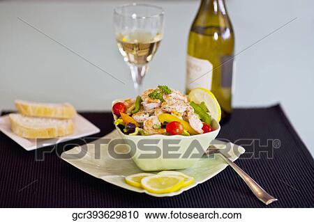 Close-up of shrimp salad served with white wine View Large Photo Image Stock Image - Close-up of shrimp salad served with white wine. Fotosearch