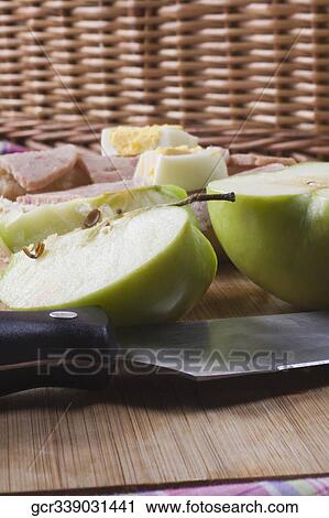 Close-up of slices of a green apple View Large Photo Image Stock Image - Close-up of slices of a green apple. Fotosearch