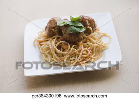 Close-up of spaghetti with meatballs View Large Photo Image Stock Photograph - Close-up of spaghetti with meatballs. Fotosearch