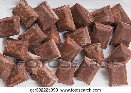 Close-up of square shape pieces of chocolate View Large Photo Image Stock Image - Close-up of square shape pieces of chocolate. Fotosearch