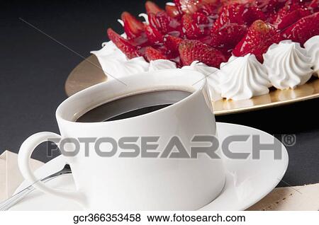 Close-up of strawberry meringue with a cup of black coffee View Large Photo Image Stock Photo - Close-up of strawberry meringue with a cup of black coffee. Fotosearch