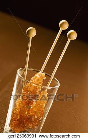 Close-up of sugar candies in a glass View Large Photo Image Stock Image - Close-up of sugar candies in a glass. Fotosearch