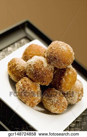 Close-up of sugar doughnut balls View Large Photo Image Stock Photo - Close-up of sugar doughnut balls. Fotosearch