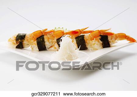 Stock Image - Close-up of sushi in a plate. Fotosearch