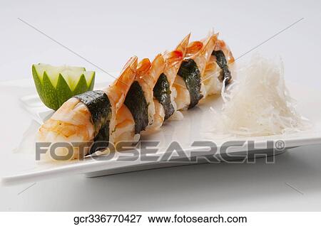 Close-up of sushi in a plate View Large Photo Image Stock Photo - Close-up of sushi in a plate. Fotosearch