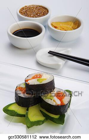 Close-up of sushi rolls on zucchini View Large Photo Image Stock Image - Close-up of sushi rolls on zucchini. Fotosearch