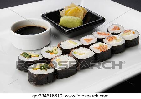 Close-up of sushi rolls with soy sauce and wasabi paste View Large Photo Image Stock Image - Close-up of sushi rolls with soy sauce and wasabi paste. Fotosearch