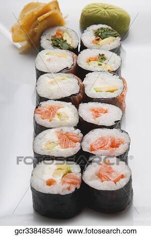 Close-up of sushi rolls with wasabi paste View Large Photo Image Stock Photograph - Close-up of sushi rolls with wasabi paste. Fotosearch