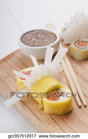 Close-up of sushi with sesame seeds in a bowl View Large Photo Image Stock Photo - Close-up of sushi with sesame seeds in a bowl. Fotosearch