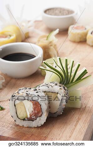 Stock Photography - Close-up of sushi with soy sauce. Fotosearch
