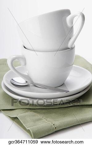 Close-up of teacups and saucers View Large Photo Image Stock Photo - Close-up of teacups and saucers. Fotosearch