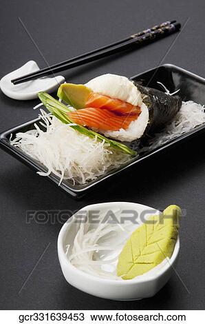 Close-up of Temaki sushi with wasabi paste View Large Photo Image Stock Image - Close-up of Temaki sushi with wasabi paste. Fotosearch
