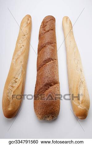 Close-up of three baguettes View Large Photo Image Stock Image - Close-up of three baguettes. Fotosearch