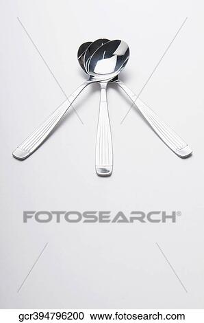 Close-up of three spoons View Large Photo Image Stock Image - Close-up of three spoons. Fotosearch