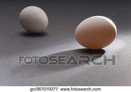 Close-up of two eggs View Large Photo Image Stock Photo - Close-up of two eggs. Fotosearch
