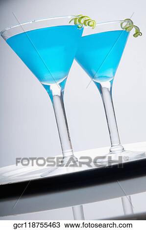 Close-up of two glasses of blue cocktail View Large Photo Image Stock Image - Close-up of two glasses of blue cocktail. Fotosearch