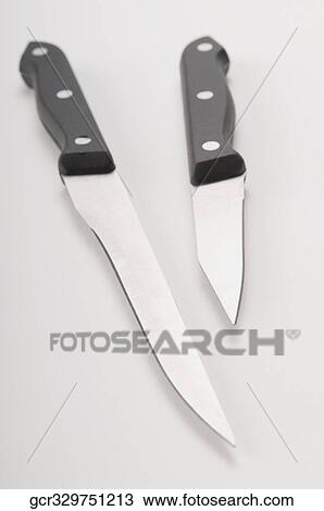 Close-up of two knives View Large Photo Image Stock Image - Close-up of two knives. Fotosearch