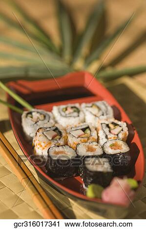 Close-up of various sushi in a plate View Large Photo Image Stock Image - Close-up of various sushi in a plate. Fotosearch