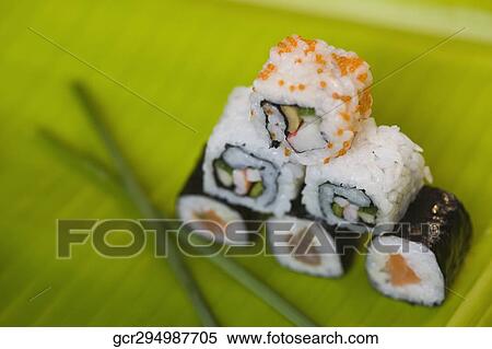 Close-up of various sushi on a leaf View Large Photo Image Stock Photography - Close-up of various sushi on a leaf. Fotosearch