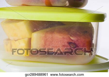 Close-up of watermelon slices in a box View Large Photo Image Stock Image - Close-up of watermelon slices in a box. Fotosearch