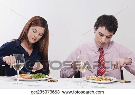Couple having lunch together View Large Photo Image Stock Image - Couple having lunch together. Fotosearch