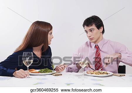Couple having lunch together View Large Photo Image Stock Photography - Couple having lunch together. Fotosearch