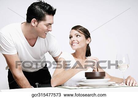 Couple looking at each other View Large Photo Image Stock Image - Couple looking at each other. Fotosearch