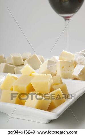 Cubes of assorted cheeses View Large Photo Image Stock Photo - Cubes of assorted cheeses. Fotosearch