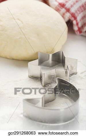 Dough with pastry cutters View Large Photo Image Stock Image - Dough with pastry cutters. Fotosearch