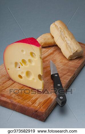 Edam cheese with crusty bread View Large Photo Image Stock Photo - Edam cheese with crusty bread. Fotosearch