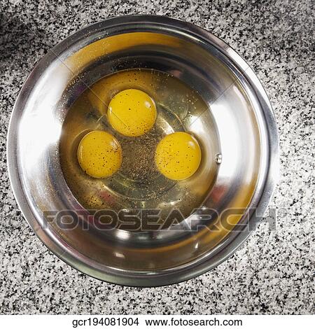 Egg yolk in a bowl View Large Photo Image Picture - Egg yolk in a bowl. Fotosearch