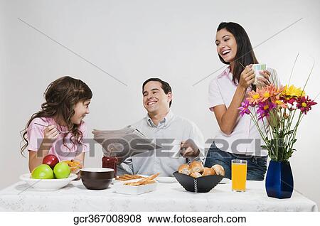 Family at the breakfast table View Large Photo Image Stock Photo - Family at the breakfast table. Fotosearch