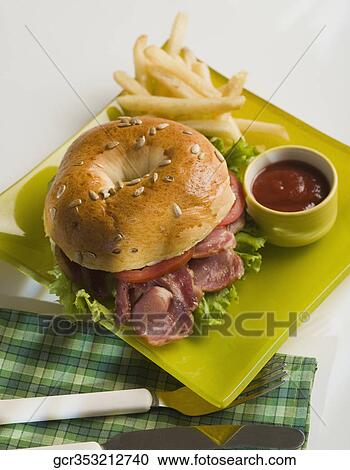 High angle view of a bacon bagel View Large Photo Image Stock Image - High angle view of a bacon bagel. Fotosearch