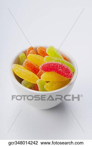 Stock Image - High angle view of a bowl of jellies. Fotosearch