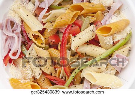 High angle view of a bowl of penne pasta and ham salad View Large Photo Image Stock Photo - High angle view of a bowl of penne pasta and ham salad. Fotosearch