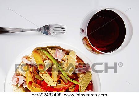 High angle view of a bowl of penne pasta and ham salad View Large Photo Image Stock Photo - High angle view of a bowl of penne pasta and ham salad. Fotosearch