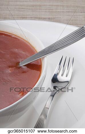 High angle view of a bowl of tomato soup View Large Photo Image Stock Photo - High angle view of a bowl of tomato soup. Fotosearch