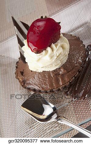 High angle view of a chocolate tart View Large Photo Image Stock Photo - High angle view of a chocolate tart. Fotosearch