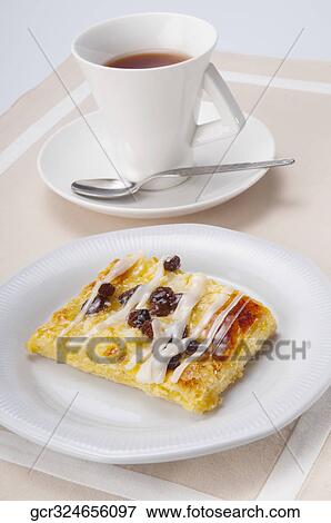 High angle view of a Danish pastry with a cup of coffee View Large Photo Image Stock Photo - High angle view of a Danish pastry with a cup of coffee. Fotosearch