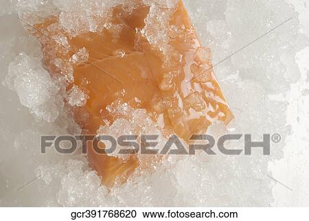 High angle view of a fish steak on ice View Large Photo Image Stock Image - High angle view of a fish steak on ice. Fotosearch