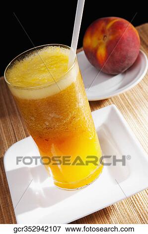 High angle view of a glass of peach cobbler View Large Photo Image Stock Photo - High angle view of a glass of peach cobbler. Fotosearch