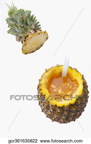 High angle view of a pineapple cocktail View Large Photo Image Stock Image - High angle view of a pineapple cocktail. Fotosearch