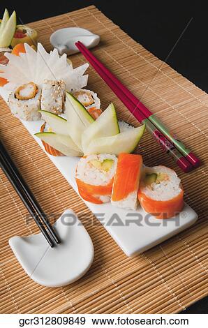 Stock Photo - High angle view of a platter of assorted sushi. Fotosearch