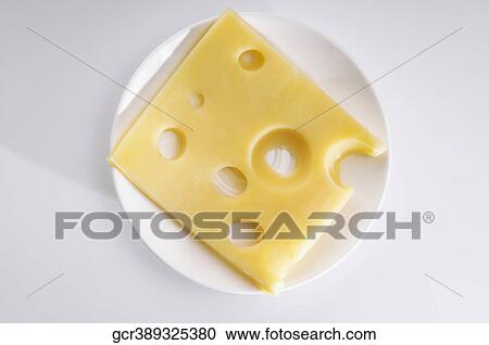 High angle view of a slice of emmenthal cheese View Large Photo Image Stock Image - High angle view of a slice of emmenthal cheese. Fotosearch