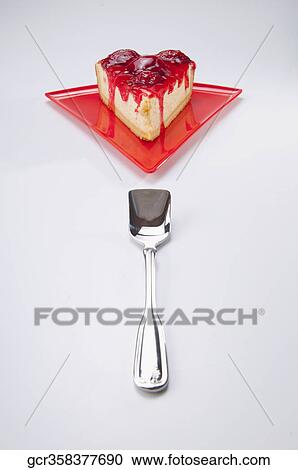 High angle view of a slice of strawberry cheesecake with a spoon View Large Photo Image Stock Image - High angle view of a slice of strawberry cheesecake with a spoon. Fotosearch