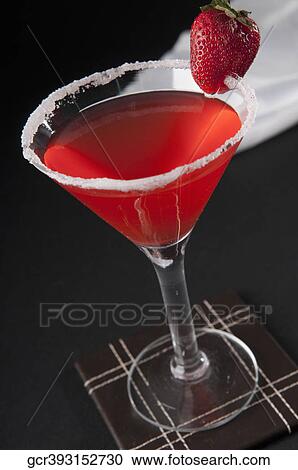 Stock Image - High angle view of a strawberry cocktail. Fotosearch