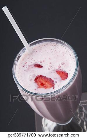 High angle view of a strawberry milkshake View Large Photo Image Stock Image - High angle view of a strawberry milkshake. Fotosearch
