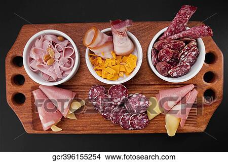 Picture - High angle view of assorted cold cuts and cheese. Fotosearch